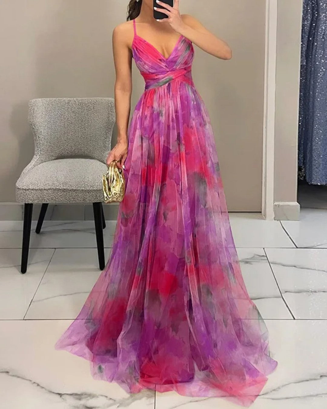 Floral print maxi dress in soft pastels, featuring adjustable straps and a flowing silhouette. 7