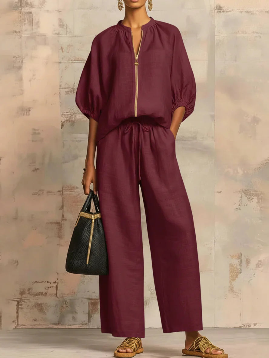 Light blue two-piece lounge outfit featuring a relaxed fit and soft fabric, perfect for comfort and leisure. 1