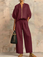 Light blue two-piece lounge outfit featuring a relaxed fit and soft fabric, perfect for comfort and leisure. 1