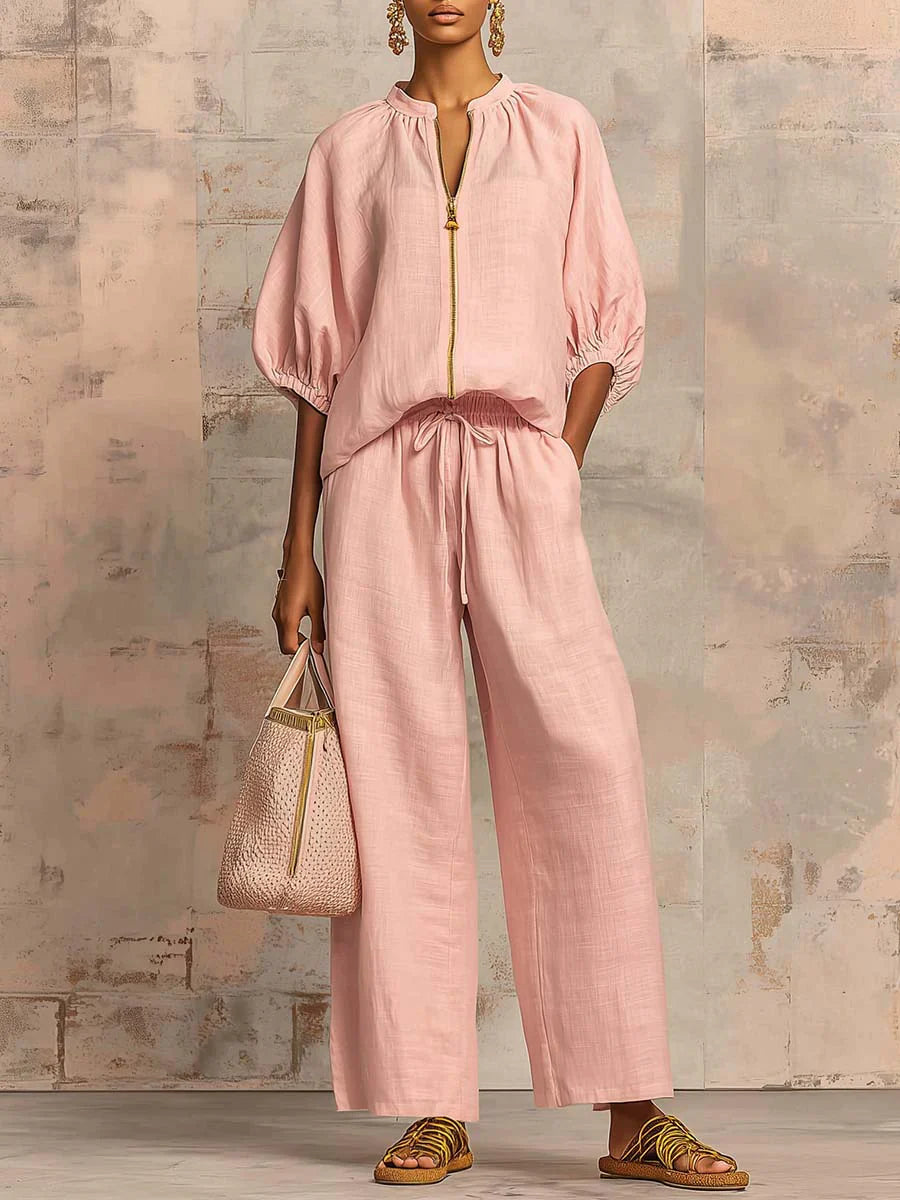 Light blue two-piece lounge outfit featuring a relaxed fit and soft fabric, perfect for comfort and leisure. 4