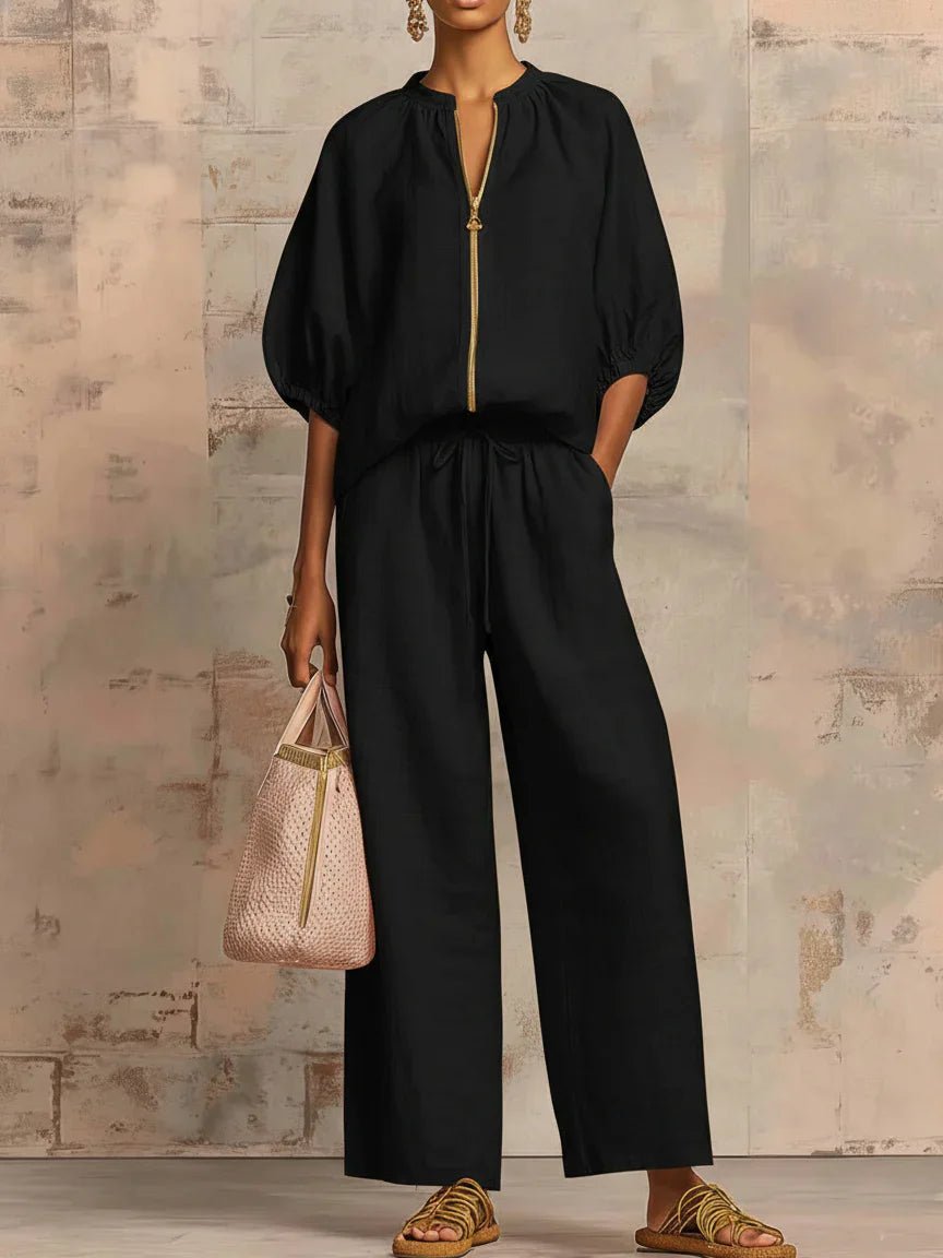 Light blue two-piece lounge outfit featuring a relaxed fit and soft fabric, perfect for comfort and leisure. 6