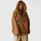Olive teddy fleece half-zip pullover for women with a raised orange floral pattern.