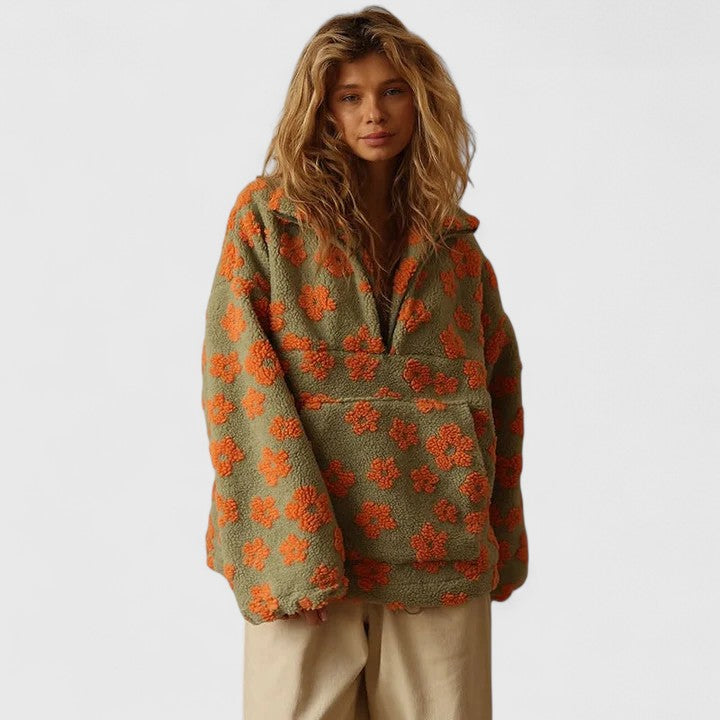 Olive teddy fleece half-zip pullover for women with a raised orange floral pattern.