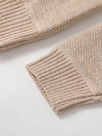 Men's zip-up knit cardigan with a ribbed stand collar.