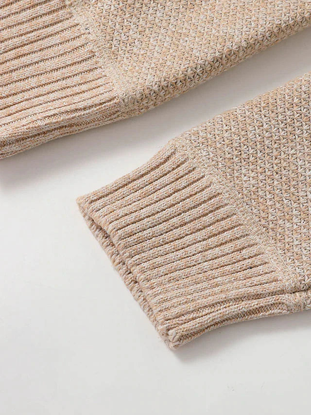 Men's zip-up knit cardigan with a ribbed stand collar.