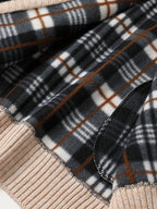 Men's zip-up knit cardigan with a ribbed stand collar.