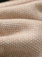 Men's zip-up knit cardigan with a ribbed stand collar.