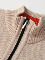 Men's zip-up knit cardigan with a ribbed stand collar.