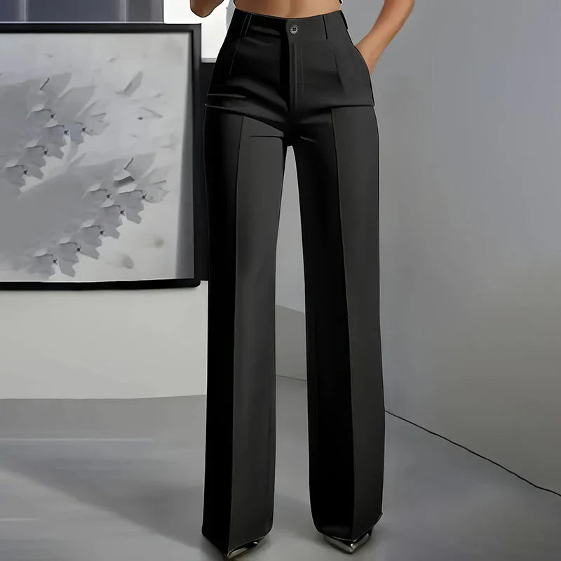 High-waisted pants in dusty rose with a chic, tailored style. 0