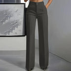 High-waisted pants in dusty rose with a chic, tailored style. 1