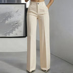 High-waisted pants in dusty rose with a chic, tailored style. 3