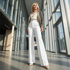 High-waisted pants in dusty rose with a chic, tailored style. 4