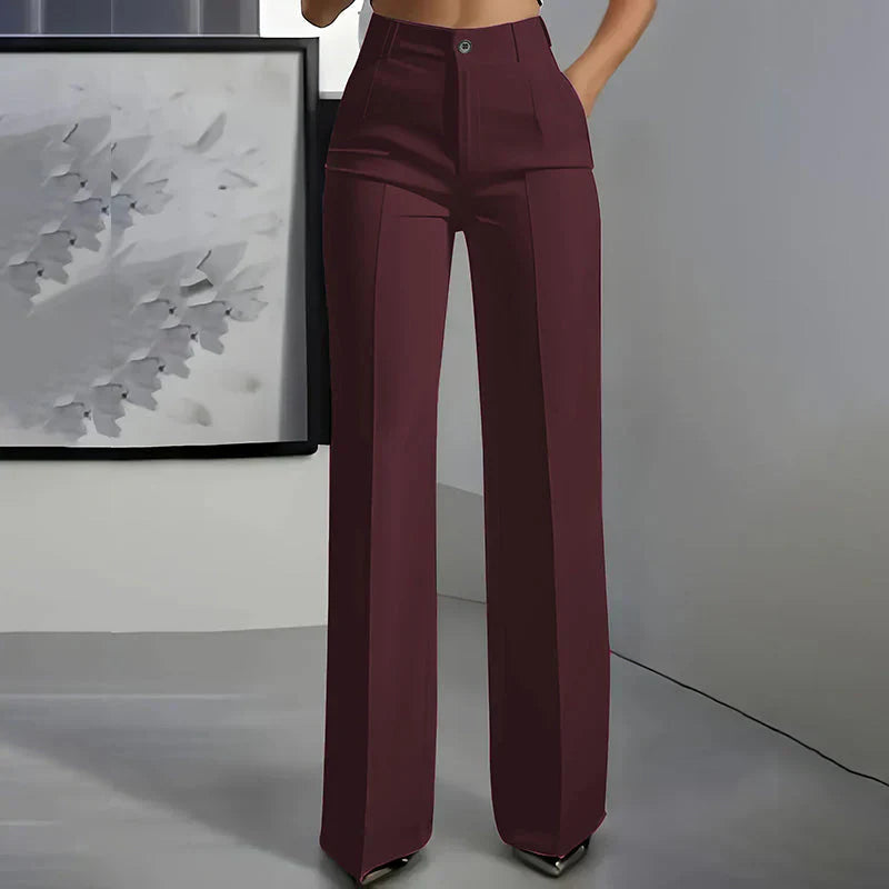 High-waisted pants in dusty rose with a chic, tailored style. 5