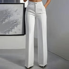 High-waisted pants in dusty rose with a chic, tailored style. 7