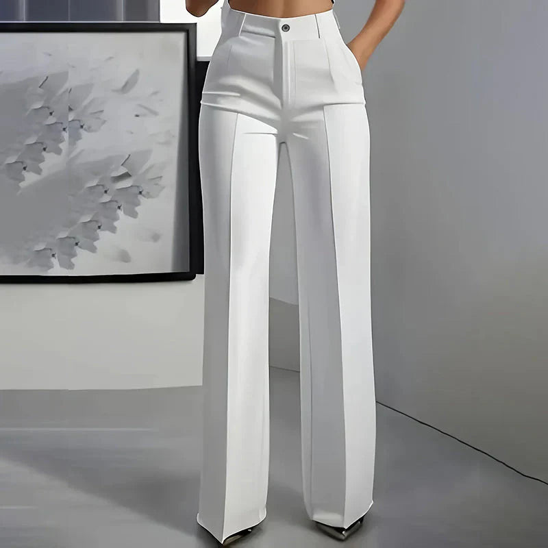 High-waisted pants in dusty rose with a chic, tailored style. 7