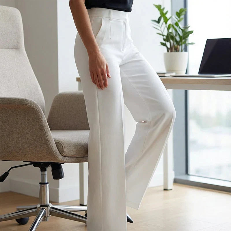 High-waisted pants in dusty rose with a chic, tailored style. 8