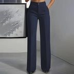 High-waisted pants in dusty rose with a chic, tailored style. 9