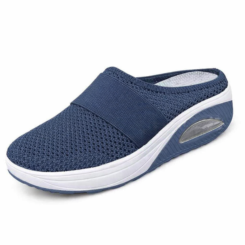 Light grey slip-on mules with a breathable upper and cushioned sole for casual comfort. 8