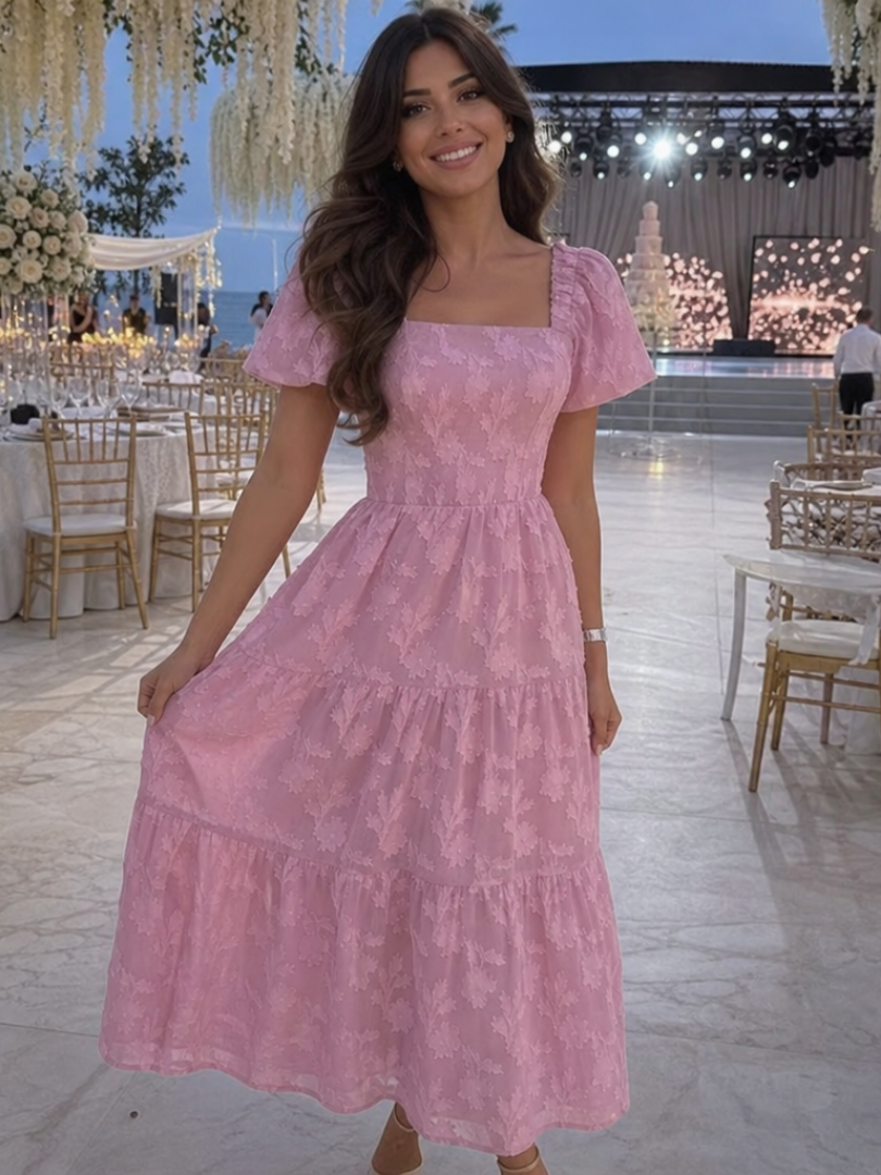 Elaria short sleeve midi dress in soft pink with a floral pattern and textured fabric for a casual, feminine look. 3