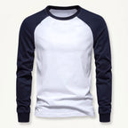 White men's long sleeve raglan t-shirt with navy contrast sleeves.
