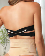 Black seamless bandeau bralette with crisscross side closure, offering a modern and minimalist style. 2