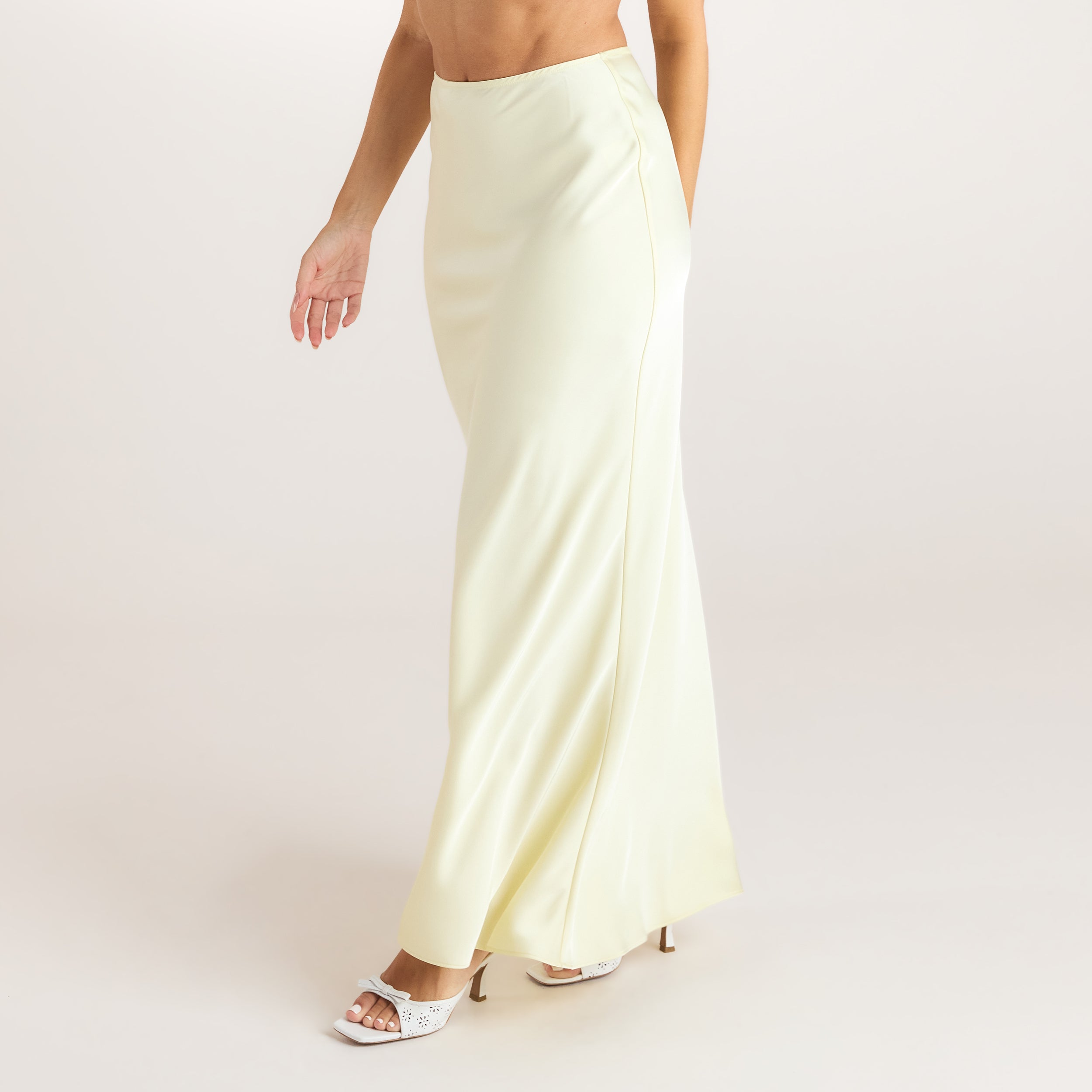 Lemon satin maxi skirt with a fishtail design and an elasticated waistband. 2