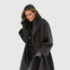Women's wide lapel wrap coat in black with a relaxed fit.