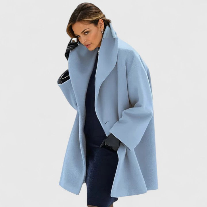Women's wide lapel wrap coat in light blue with a relaxed fit.
