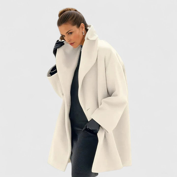 Women's wide lapel wrap coat in cream with a relaxed fit.