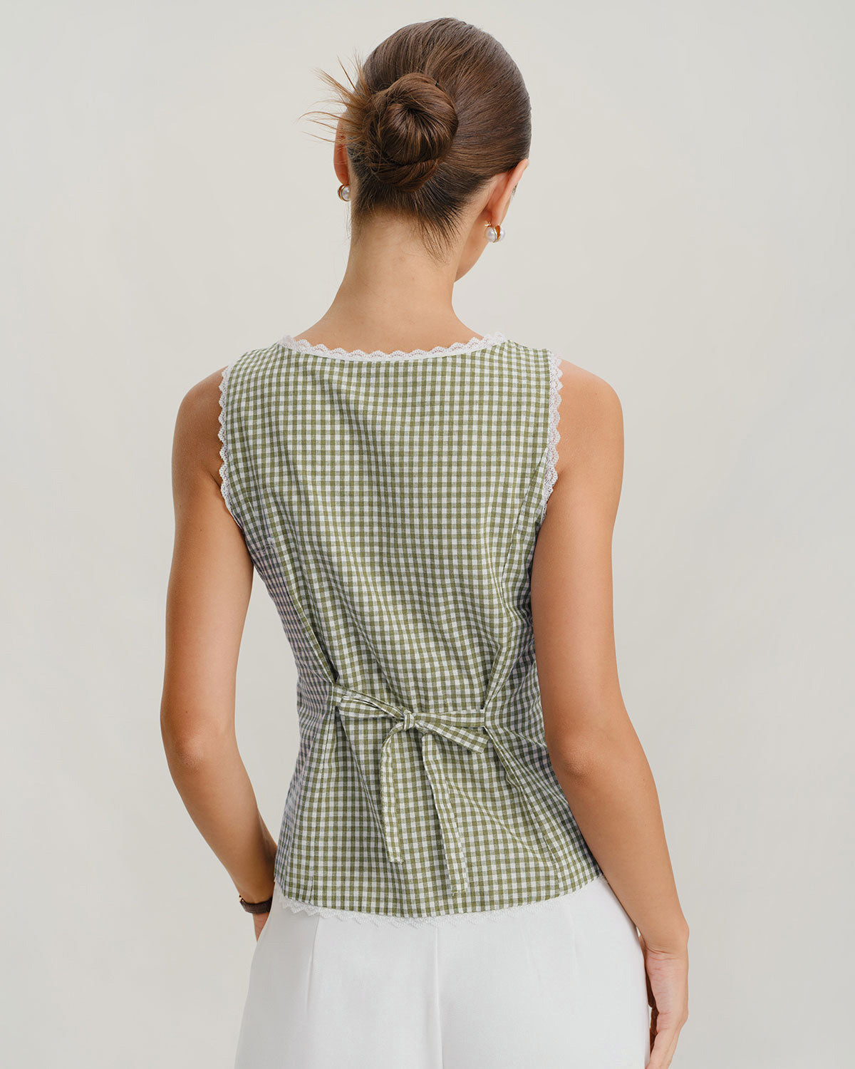Light green plaid tank top with a boat neck, slim fit, and sleeveless design. 3