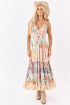 Sky blue maxi dress featuring a floral print and lace trim for a bohemian style. 0