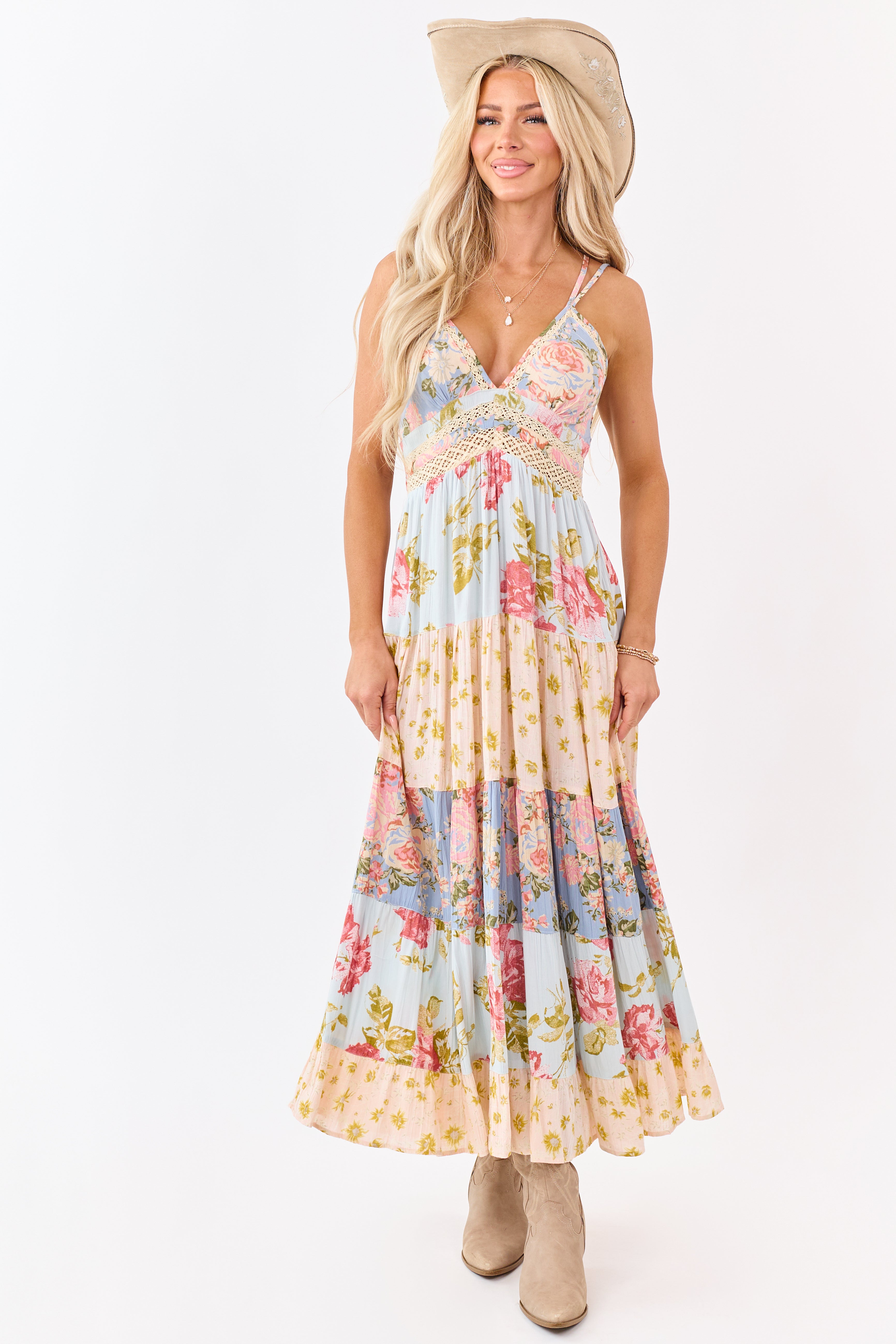 Sky blue maxi dress featuring a floral print and lace trim for a bohemian style. 0