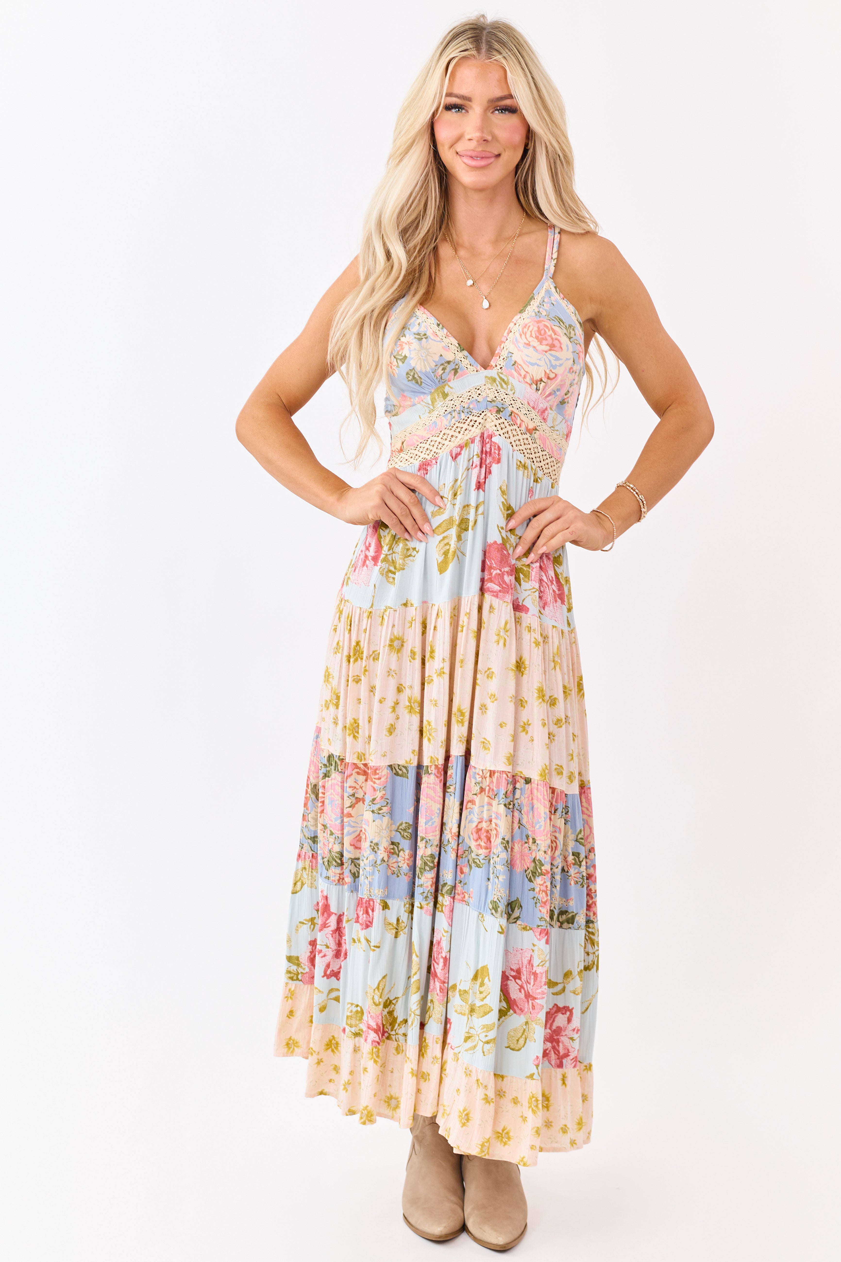 Sky blue maxi dress featuring a floral print and lace trim for a bohemian style. 1