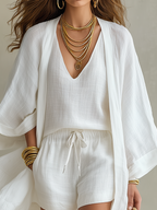 Lightweight three-piece loungewear set in soft beige, featuring a relaxed fit and layered design. 8