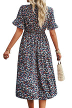 Light blue floral summer dress with a flowing, relaxed fit and delicate straps. Perfect for warm-weather outings. 5