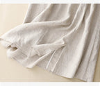 Light blue linen skirt with a relaxed fit and a flowy style, perfect for casual summer outings. 7