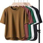 Oversized t-shirt in soft lavender, featuring a relaxed fit and minimalistic design. 0