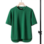 Oversized t-shirt in soft lavender, featuring a relaxed fit and minimalistic design. 5