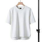 Oversized t-shirt in soft lavender, featuring a relaxed fit and minimalistic design. 6