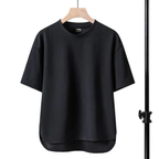 Oversized t-shirt in soft lavender, featuring a relaxed fit and minimalistic design. 7
