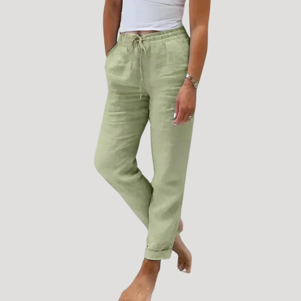 Lightweight cotton-linen trousers in soft beige with a relaxed fit and drawstring waist. Casual and comfortable style. 0