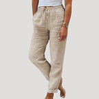 Lightweight cotton-linen trousers in soft beige with a relaxed fit and drawstring waist. Casual and comfortable style. 2