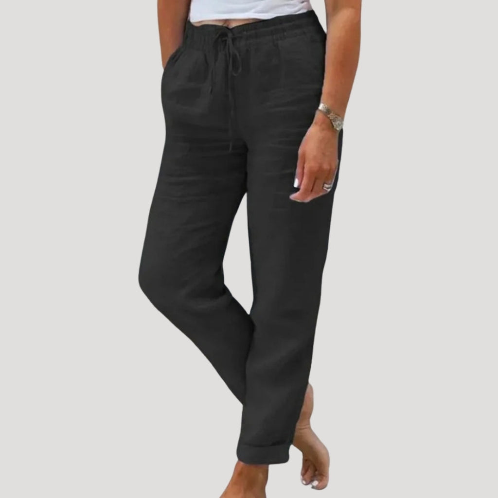 Lightweight cotton-linen trousers in soft beige with a relaxed fit and drawstring waist. Casual and comfortable style. 3
