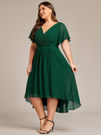 Plus size chiffon midi dress with a pleated double V-neck and flutter sleeves.