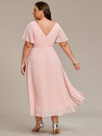 Plus size chiffon midi dress with a pleated double V-neck and flutter sleeves.
