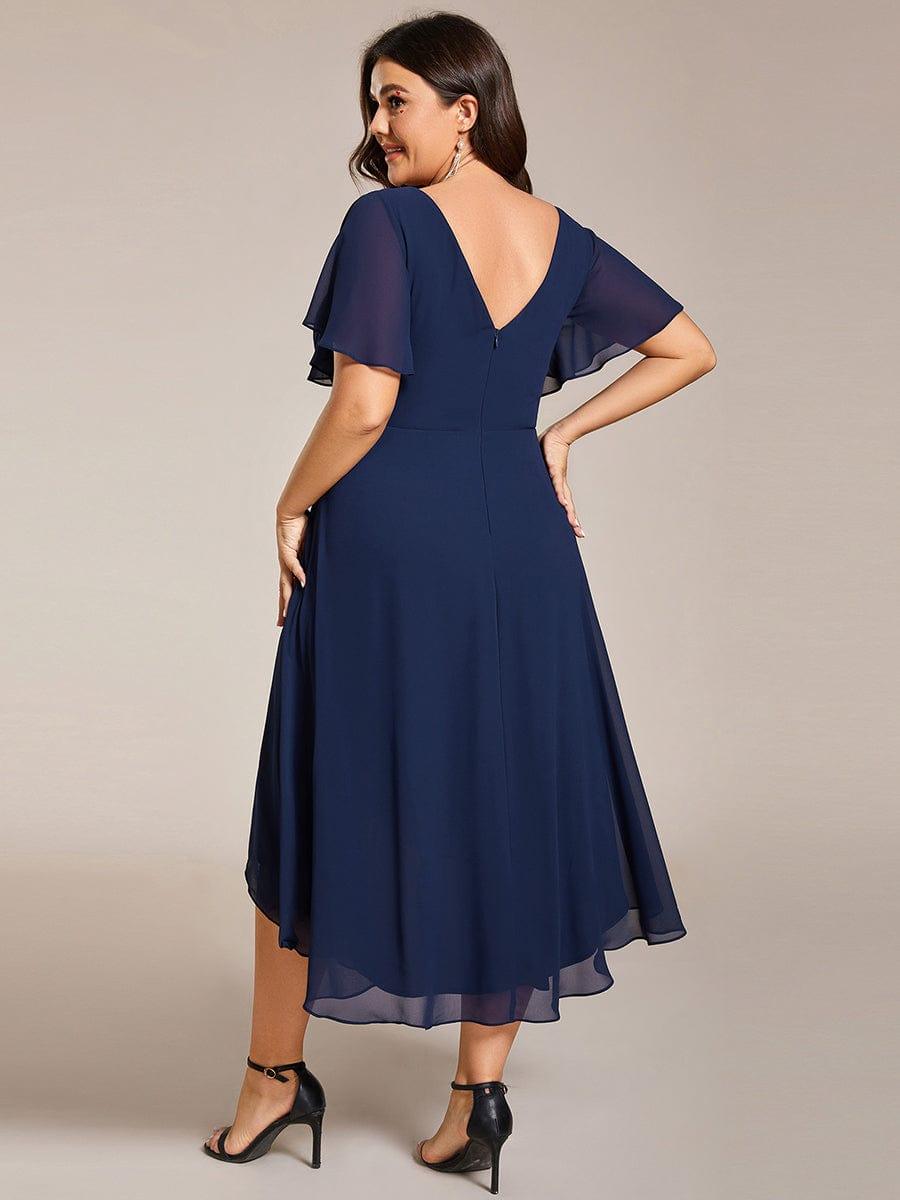 Plus size chiffon midi dress with a pleated double V-neck and flutter sleeves.