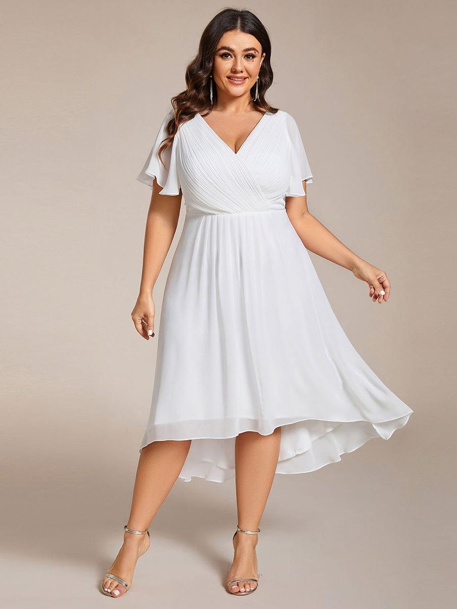 Plus size midi dress in blush pink with a double V-neck and ruffle sleeves, perfect for wedding guests. 14