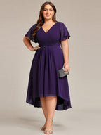 Plus size midi dress in blush pink with a double V-neck and ruffle sleeves, perfect for wedding guests. 19