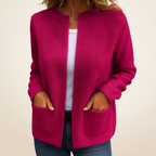 Grey ribbed knit open cardigan for women with a round collar and patch pockets.
