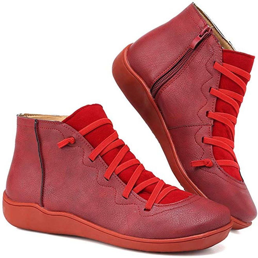 Women's ankle boots with a criss-cross lace detail and a side zip.